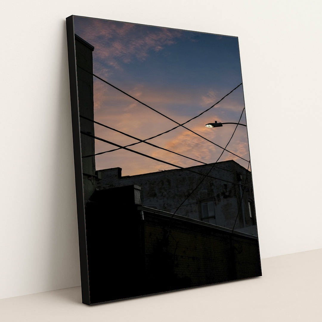 Silhouetted Streetlamp at Sunset by Connor McManus - Black Frame Stretchiez