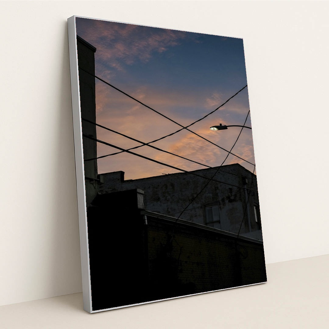 Silhouetted Streetlamp at Sunset by Connor McManus - Silver Frame Stretchiez