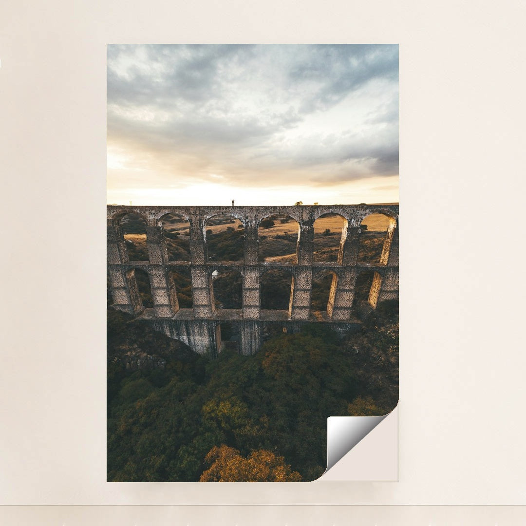 Sunset Over Ancient Aqueduct by Mikhail Nilov - Peeliez
