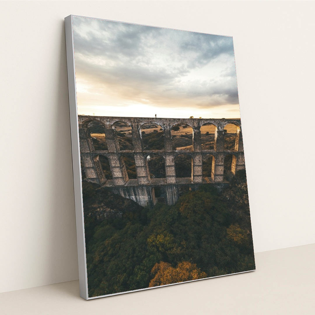 Sunset Over Ancient Aqueduct by Mikhail Nilov - Silver Frame Stretchiez