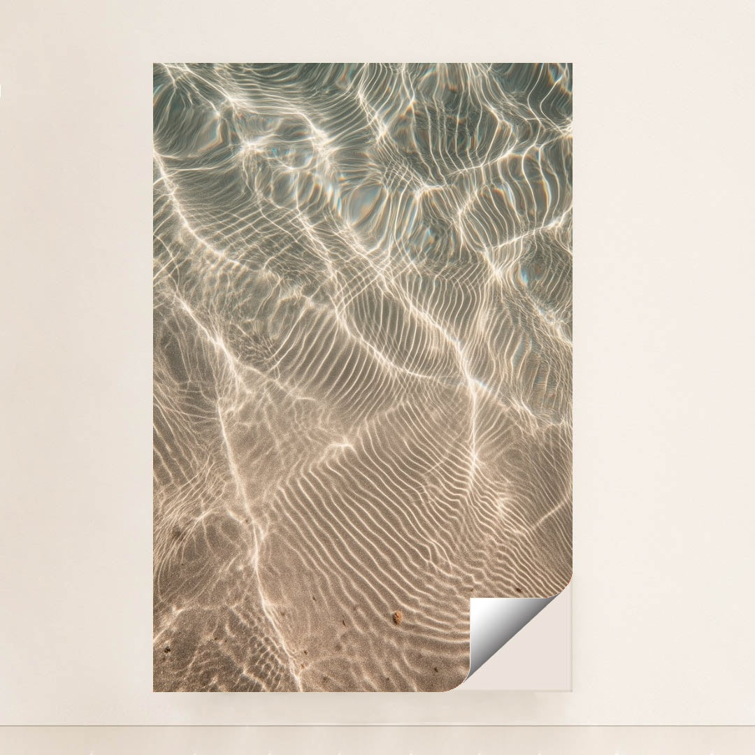 This artwork features shimmering sunlight patterns rippling across sandy underwater textures, shown unframed.