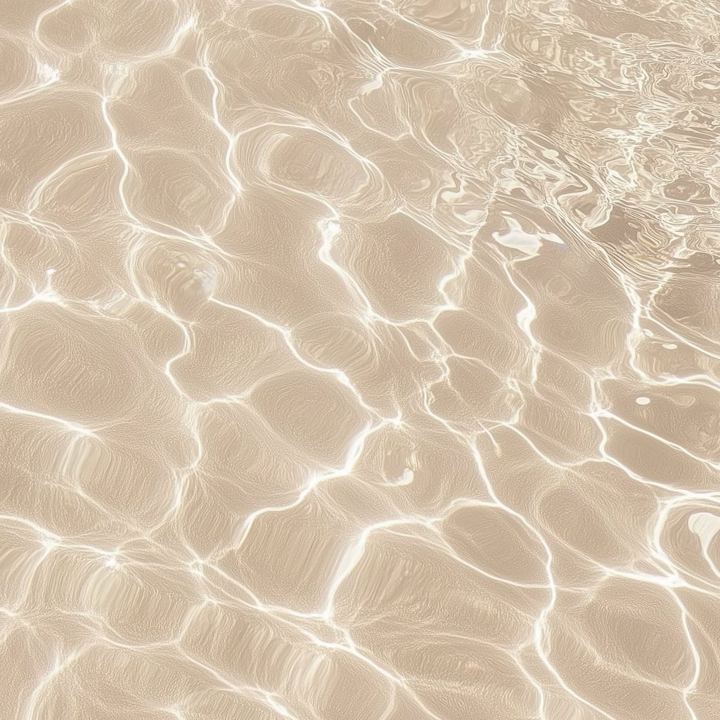 This artwork features sunlight reflecting on shallow sand and water, creating bright abstract patterns.