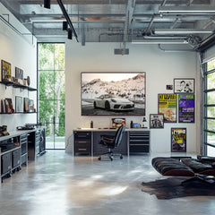 Stylish office featuring car wall art of 911 Parked in the Mountains against a backdrop of snowy mountains.