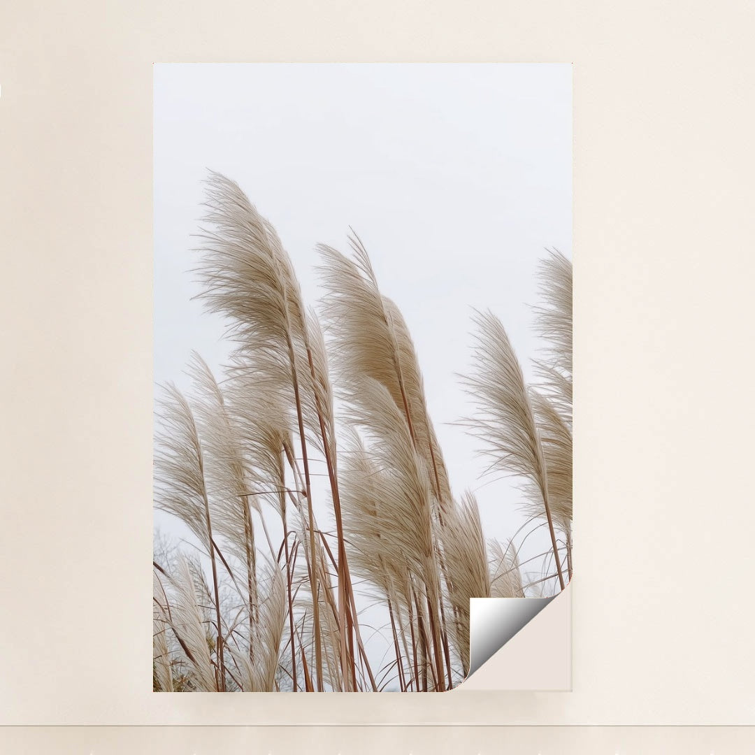 This artwork features tall beige pampas grass stems against a pale sky, unframed.