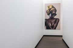 Max Vakhtbovycn - Interior if empty hallway with colorful poster on white wall and parquet floor