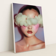 Porcelain Eclipse wall art featuring a surreal portrait of a woman with clouds in her head in white frame.