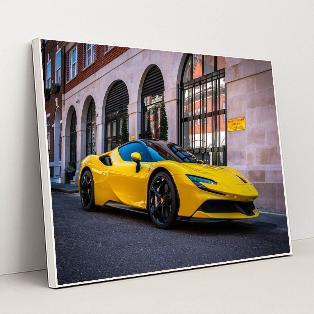 This photo shows a yellow Ferrari SF90 Stradale parked on the street in front of elegant city buildings, in a white frame.